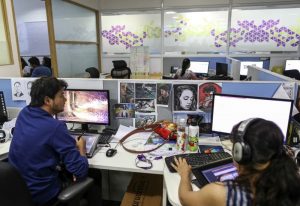 Employees work at the Think and Learn office in Bengaluru, India.